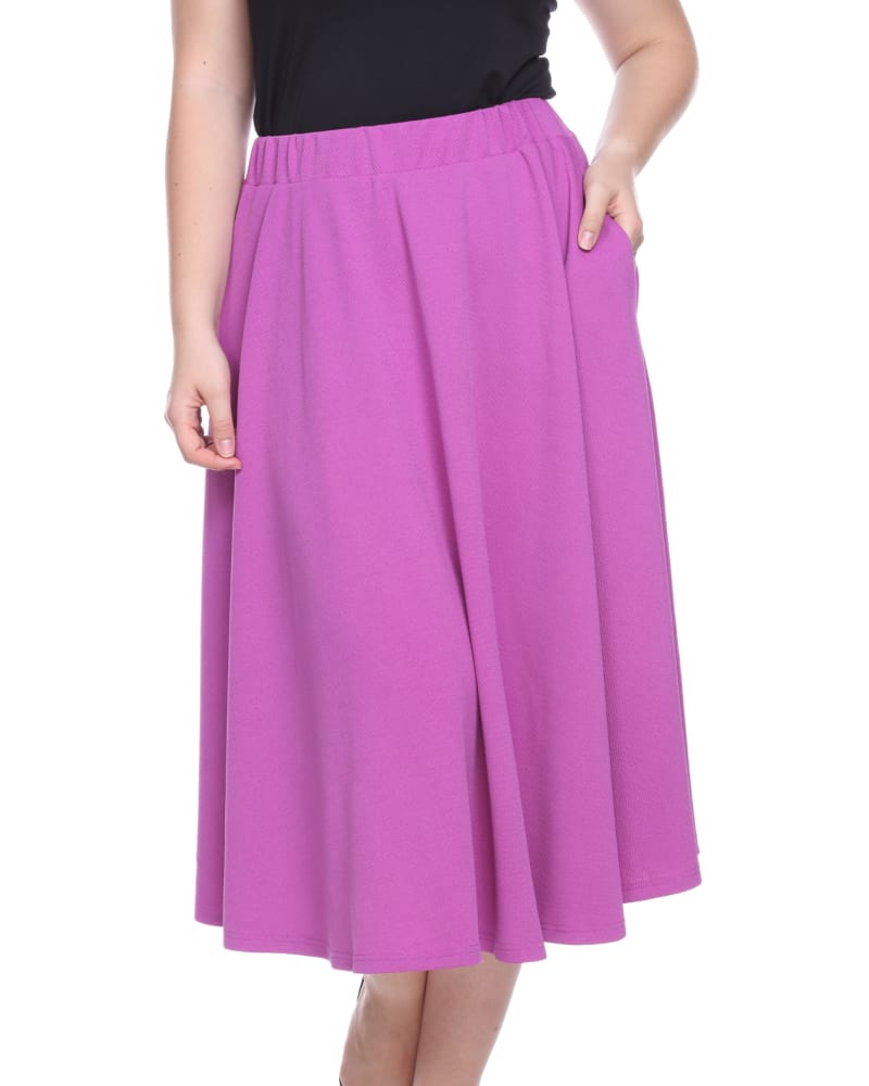 Front of a model wearing a size 3X Tasmin Flare Midi Skirt in Purple by White Mark. | dia_product_style_image_id:249187